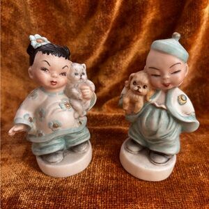 Vintage Bisque porcelain figurine pair